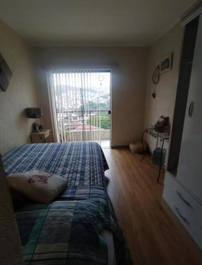Quarto aconchegante Bela Vista